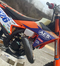 Carbon MAXCoverage Pipe Guard Stock KTM 125 SX/XC 2023-2024 | Husqvarna TC125 2023-2024 | GasGas MC125 2024