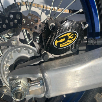 P3 Carbon Rear Brake Caliper Guard Yamaha / Fantic 125 / 250 / 450 Models | 2020 - 2026 (See Fitment Chart) - 0